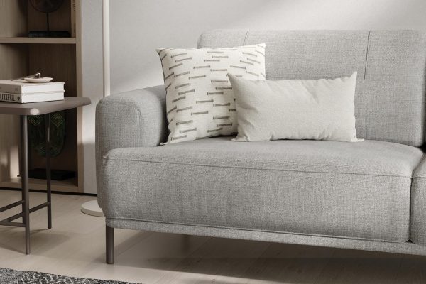 Varena light grey woven sofa bed with plush feather-filled backrest for comfort